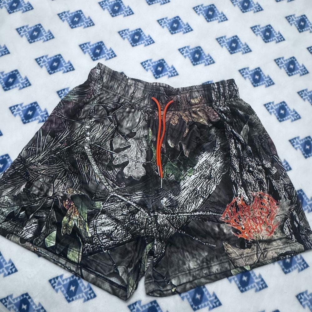 Camouflage Mesh Shorts with Orange Accents